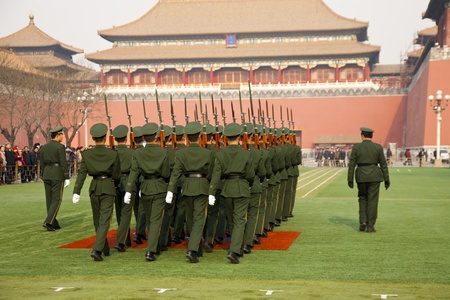 Beijing, China - December 27, 2011. Young soldiers marching in the Forbidden City.のeditorial素材