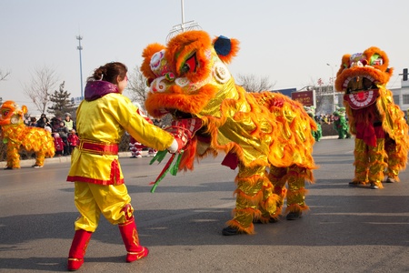 Yu County, Hebei province, China - February 5th, 2012: Chinese people celebrated Lantern Festival by showing traditional lion dancing.のeditorial素材