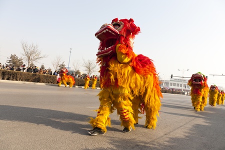 Yu County, Hebei province, China - February 5th, 2012: Chinese people celebrated Lantern Festival by showing traditional lion dancing.のeditorial素材
