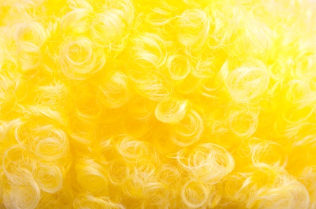 A shot of yellow artificial hair background 