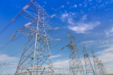 Electrical transmission tower under clear skyの写真素材