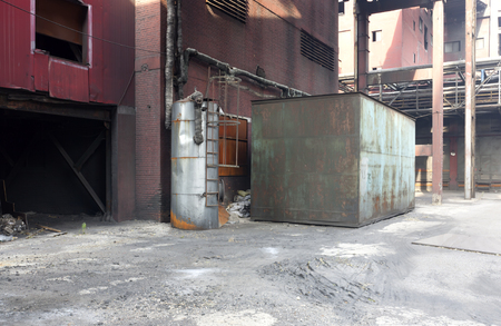 An abandoned steel mill with old machine.の写真素材