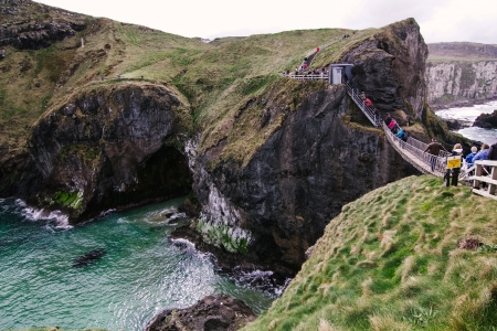 Famous Rope Bridge at Carrick-a-Rede in Northern Island taken from the connecting islandsの写真素材