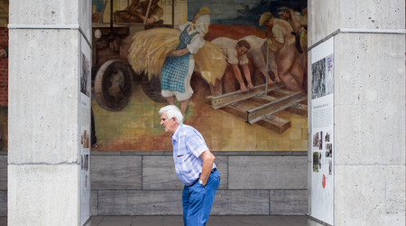 An old man reading the facts on Old Luftwaffe Headquarters, Berlin, Germanyのeditorial素材