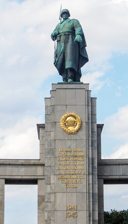 Statue of Russian soldier at Soviet War Memorial in Tiergarten, Berlin, Germanyのeditorial素材