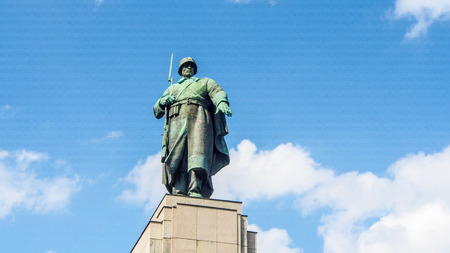 Statue of Russian soldier at Soviet War Memorial in Tiergarten, Berlin, Germanyのeditorial素材