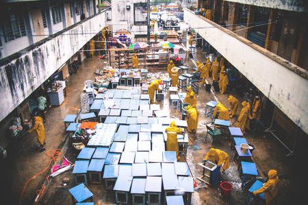 Volunteers cleaning the school that affected by flood disaster in Tanah Merah, Kelantan, Malaysiaのeditorial素材