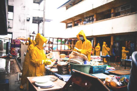 Volunteers cleaning the school that affected by flood disaster in Tanah Merah, Kelantan, Malaysiaのeditorial素材