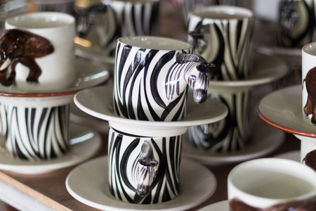 Ceramic cups on sale at market, Thailand.の写真素材