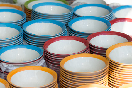 Stacked ceramic Colorful bowls ceramic products and industry in Lampang Thailand.の写真素材