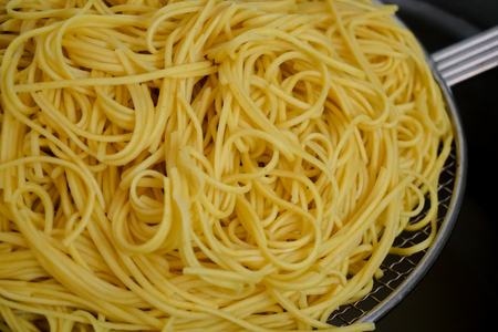 Homemade Noodle on raw colander.の写真素材