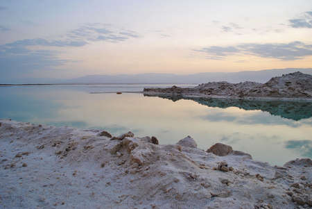 Sunrise over the Dead Sea shore in Israel. The lowest place on Earth. Salt crystals at sunriseの写真素材