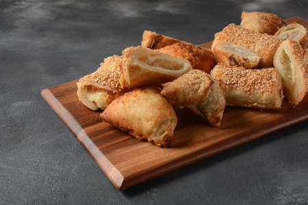Vegetarian samosas pastries filled with potato, mushrooms, tuna. Middle Eastern  food- samsa
