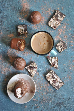 Cup of coffee, chocolate, cocoa powder