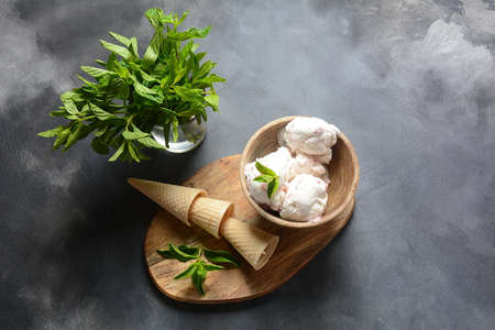 Ice cream scoops and waffle conesの写真素材