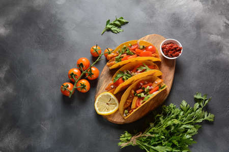 Tacos with grilled chicken and vegetables - Mexican food styleの写真素材