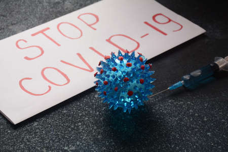 Vaccine for coronavirus 2019-nCoV. Photo of vaccine, medical injection and coronavirus. Stop...