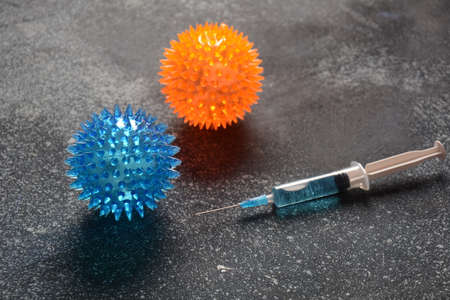 Vaccine for coronavirus 2019-nCoV. Photo of vaccine, medical injection and coronavirus. Stop...