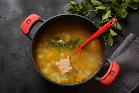 Fresh  fish soup on black backgroundの写真素材