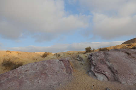 Desert landscape at sunrise. Hiking desert part of Israel National Trail. Negev desert . Valley....