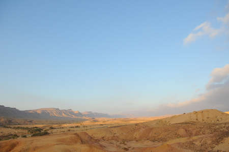 Desert landscape at sunrise. Hiking desert part of Israel National Trail. Negev desert . Valley....