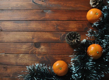 Happy New Year  and Merry Christmas  greetings on wooden background. Empty space for textの写真素材