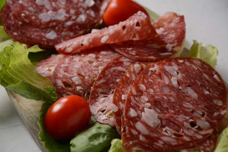 Slices of Salchichon a Spanish summer sausageの写真素材