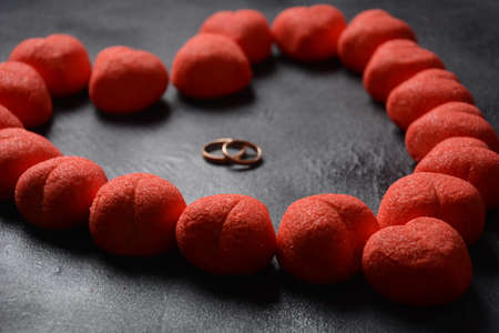 Heart-Shaped red Marshmallows Colored sweet chewy candies. Wedding or Valentine's Day concept