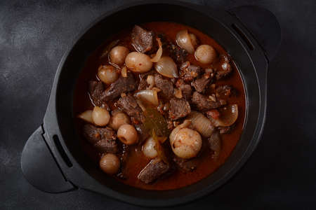 Greek beef stifado. Stew with beef, onion bulbs, cinnamon and spicesの写真素材