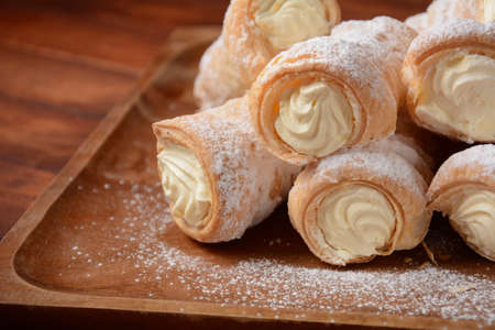 Elegant french cream horn pastries. Delicious cream horns filled with vanilla cream