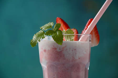Strawberries with ice cream in glass cup. Summer dessert
