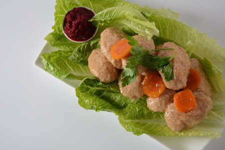 Gefilte fish with carrots, lettuce, horse radish . Passover traditional Jewish food-  celebration...