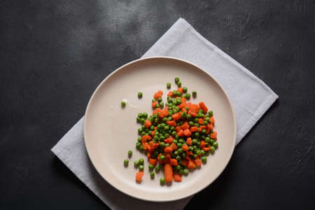 Boiled carrots and peas. Healthy foodの写真素材