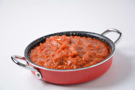 Matbucha - Moroccan Tomato dip, spread or condiment - Cooked Spicy Tomatoes, Peppers, Garlic and Chili Pepperの写真素材
