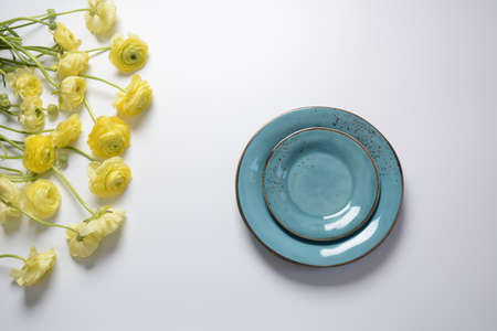 Easter table setting with floral decor on table. Elegance dinner.の写真素材