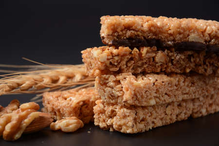 Various healthy granola bars (muesli or cereal bars). Set of energy, sport, breakfast and protein...