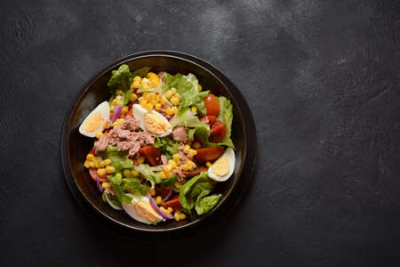 Tuna Fish Salad with Lettuce, Cherry Tomatoes, Cucumber, boiled eggs, onions and Cornの写真素材
