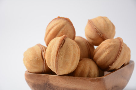 Cookies Nuts with condensed milk and nuts. Fresh homemade cookies in a shape of nuts