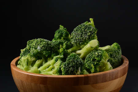 Small frozen  broccoli pieces.  Healthy food. Frozen vegetablesの写真素材
