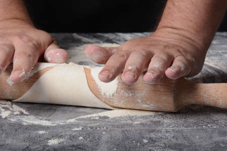 Process of making home-made dough for dumplings, ravioli or pelmeni with minced meat.