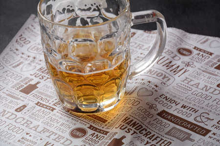 Beer mug on the table with beer. Oktoberfest concept.