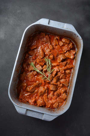 Beef stew with rosemary in a bowl