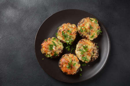 Stuffed mushroom caps with cream cheese, parmesan, garlic and herbs.の写真素材