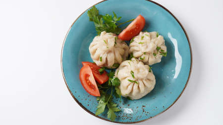 Georgian dumplings Khinkali with meat and red pepper, Traditional National Georgian cuisine.