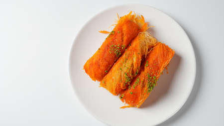 Knafeh -  a Middle Eastern cheese pastry soaked in sweet, sugar-based syrupの写真素材