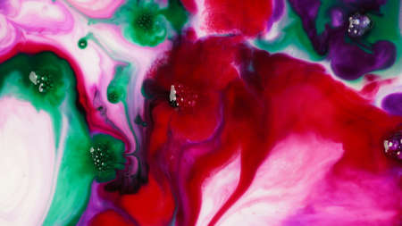 Abstract colors, backgrounds and textures. Oil coloring in milk creating bright colorful abstract...