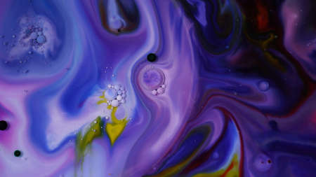 Abstract colors, backgrounds and textures. Oil coloring in milk creating bright colorful abstract...