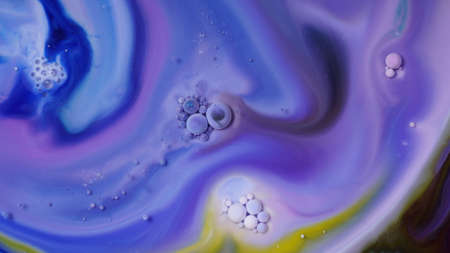 Abstract colors, backgrounds and textures. Oil coloring in milk creating bright colorful abstract...