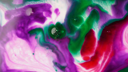 Abstract colors, backgrounds and textures. Oil coloring in milk creating bright colorful abstract...