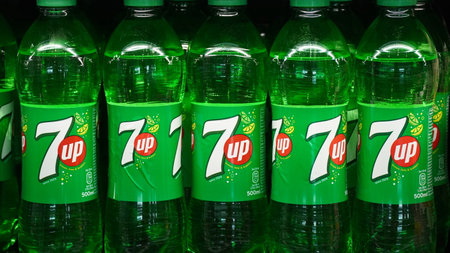 Limassol, Cyprus - October  12, 2022: 7 up carbonated drink plastic bottles on hypermarket shelvesのeditorial素材